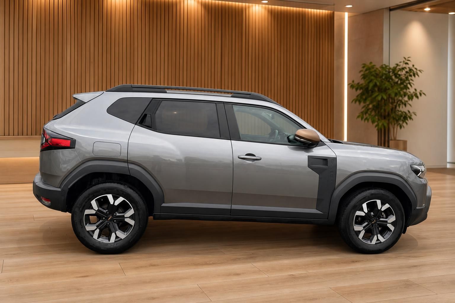 Dacia Duster SUV grau Seitenansicht im Showroom – kompakter Geländewagen