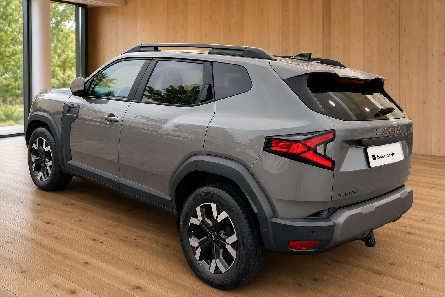 Dacia Duster grau Heckansicht schräg mit Rückleuchten – Bekemeier Autohaus