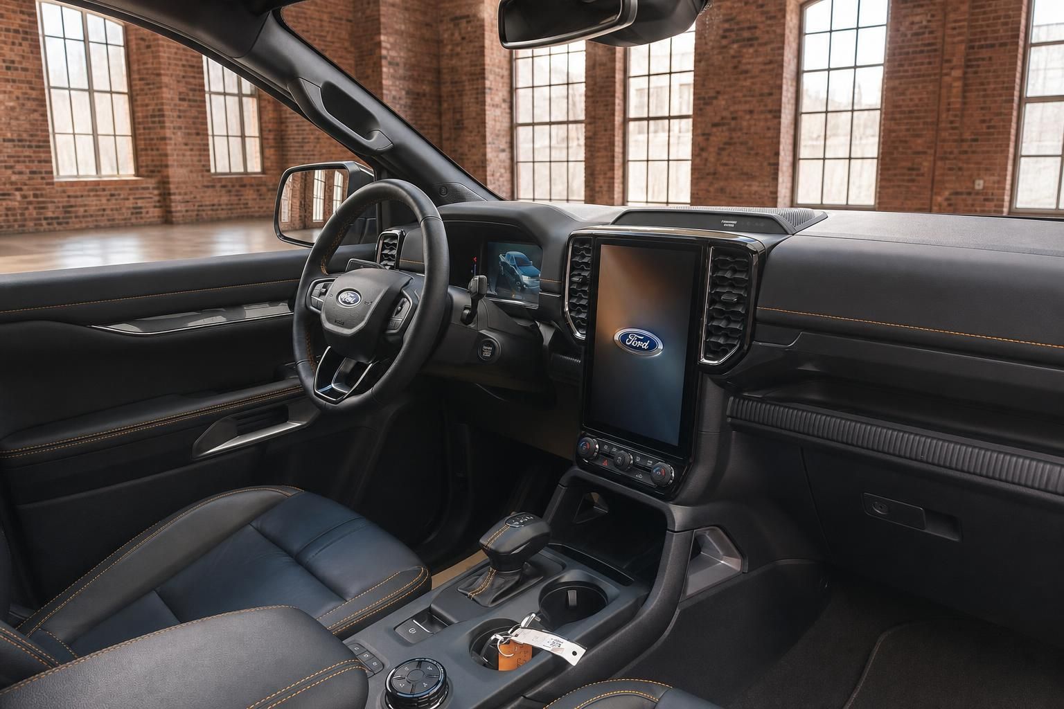 Ford Ranger Innenraum Armaturenbrett mit großem Touchscreen Ford-Logo schwarzes Leder