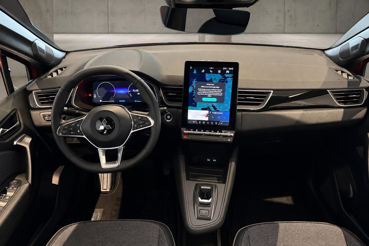 Mitsubishi Innenraum mit Lenkrad, Navigationsdisplay und Mittelkonsole