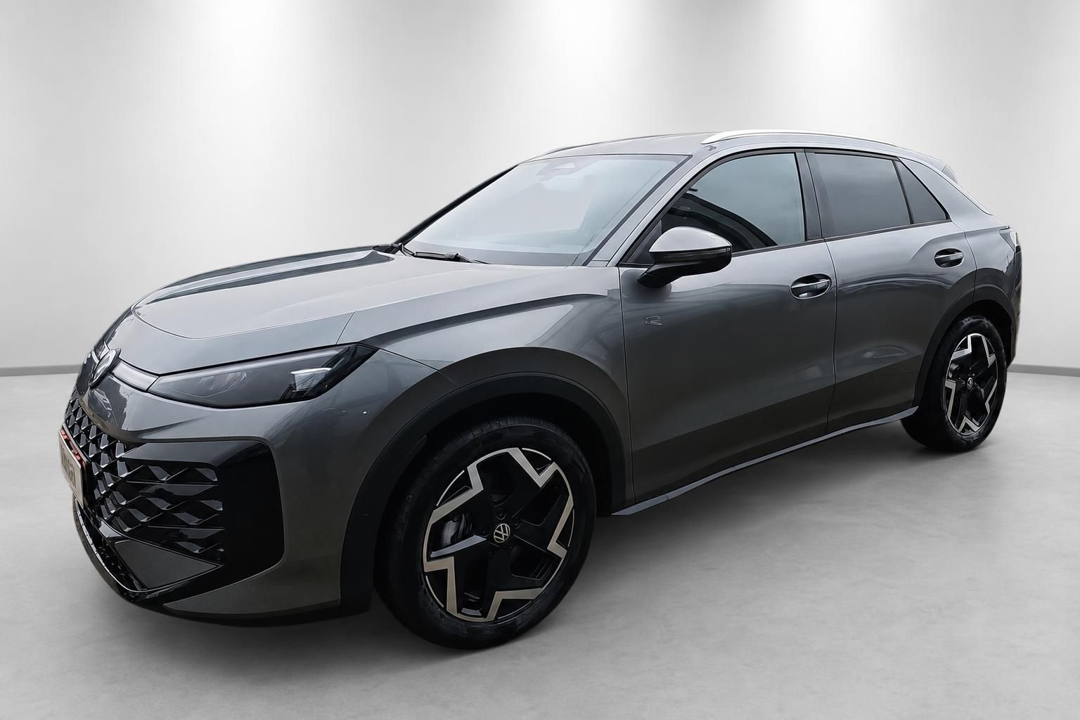 VW T-Roc R grau, Frontansicht schräg im Studio