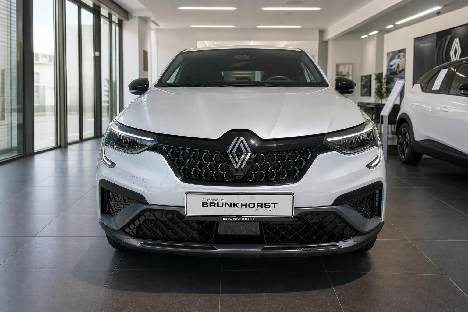 Renault Arkana Frontansicht mit charakteristischem Kühlergrill und LED-Tagfahrlicht
