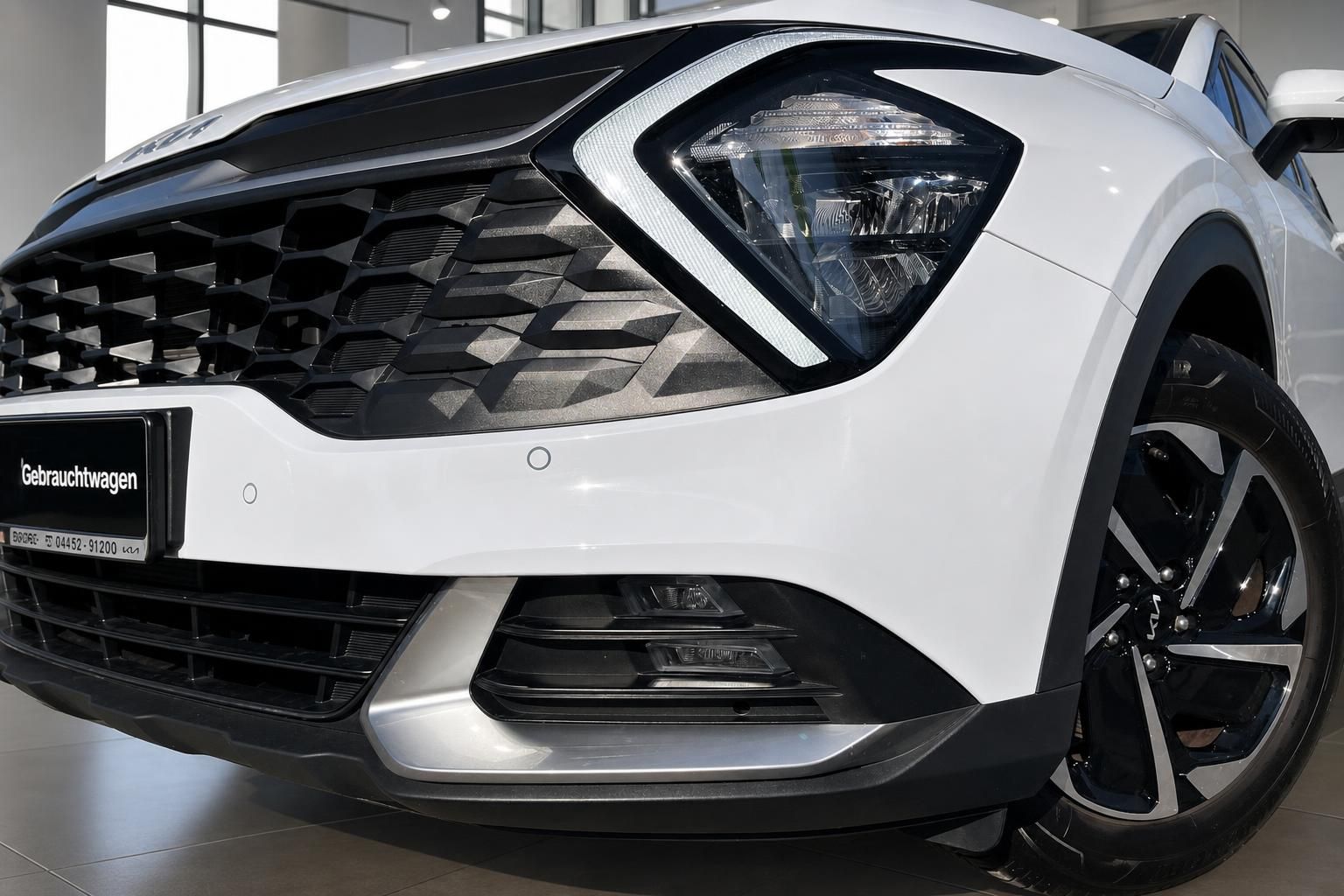 Kia Sportage Gebrauchtwagen: Frontscheinwerfer und Kühlergrill im Detail