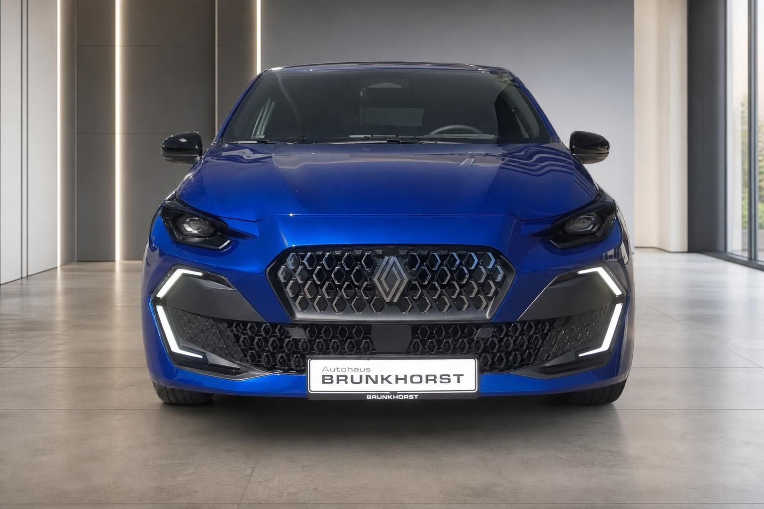 Renault Clio blau Frontansicht mit LED-Scheinwerfern und Kühlergrill