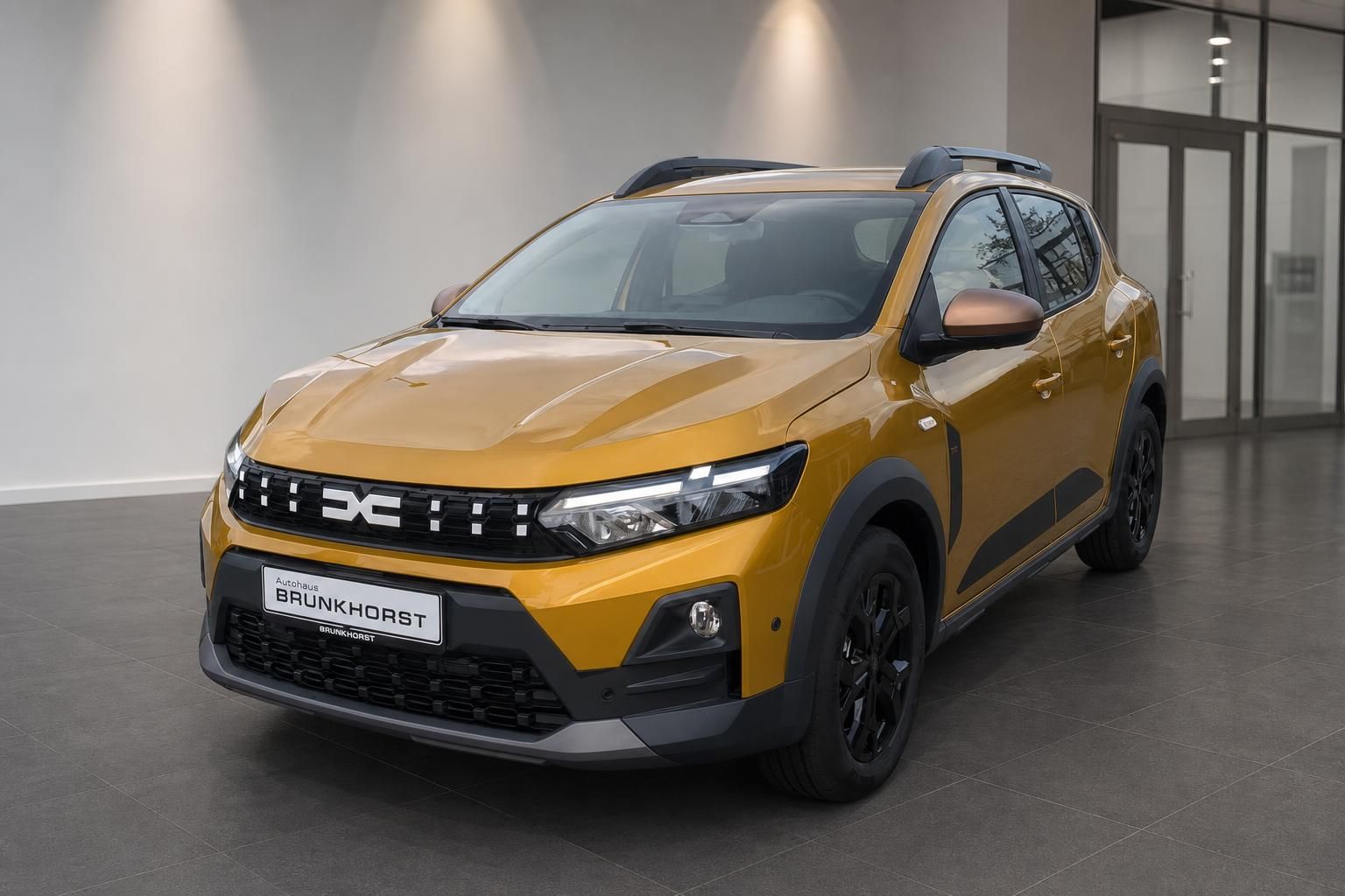 Dacia Sandero Stepway gelb, Frontansicht schräg im Autohaus Brunkhorst