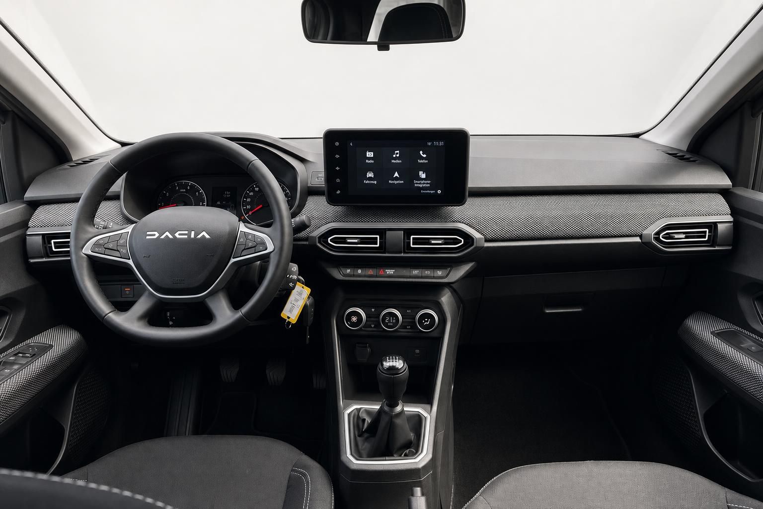 Dacia Cockpit-Innenansicht mit Lenkrad, Armaturenbrett und Touchscreen-Display