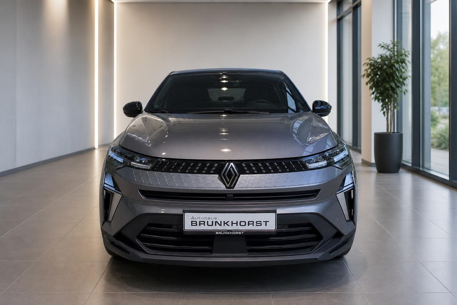Renault Captur Frontansicht in grau, moderne LED-Scheinwerfer und Kühlergrill