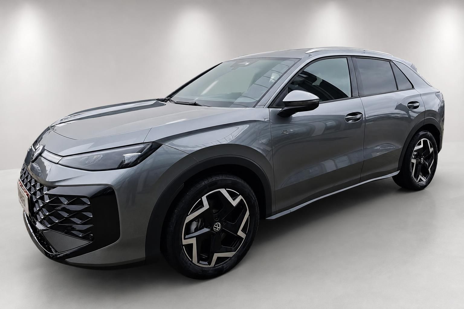 VW T-Roc R grau, Frontansicht schräg im Studio