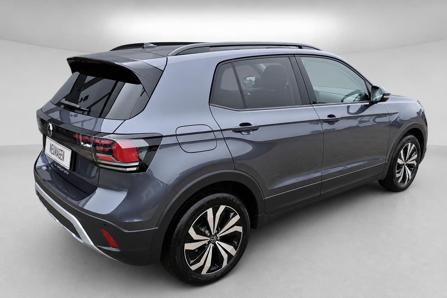Volkswagen T-Cross in Grau - Seitenansicht von hinten im Studio