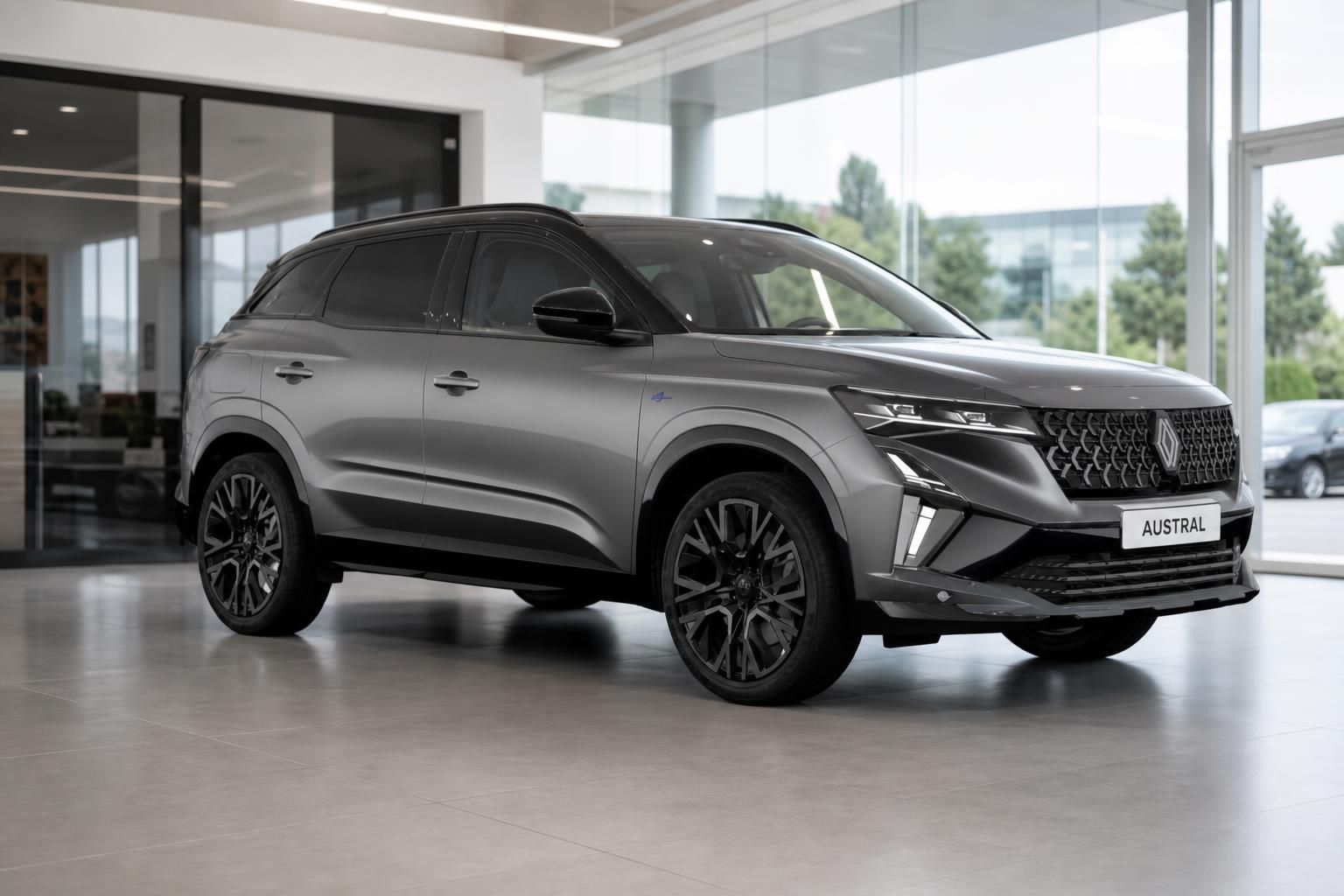 Renault Austral E-Tech grau Frontschräge links im Autohaus Showroom