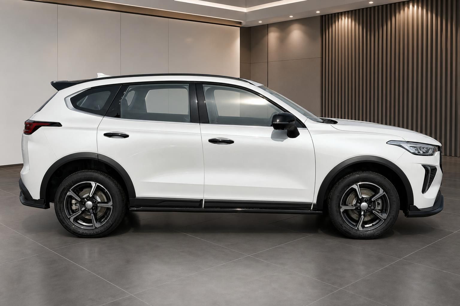 GWM Jolion Pro weiss Seitenansicht – kompakter SUV mit schwarzen Radhausverbreiterungen