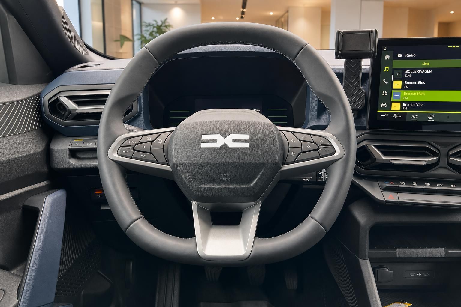 Fahrzeug Innenraum mit modernem Lenkrad und Infotainment-System