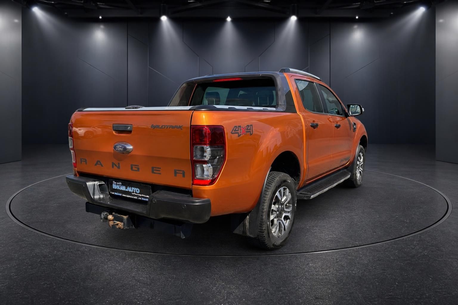Ford Ranger Wildtrak 4x4 Pick-up orange metallic Heckansicht mit Allradantrieb