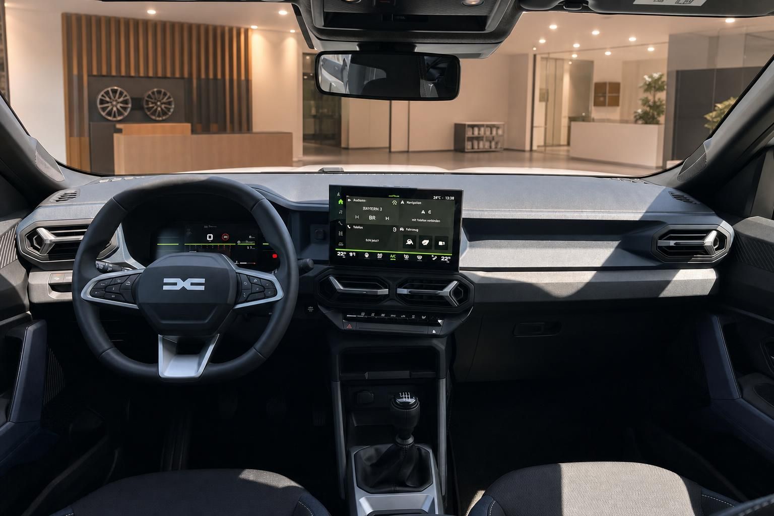 Dacia Bigster Cockpit Ansicht mit Infotainment Display im Showroom