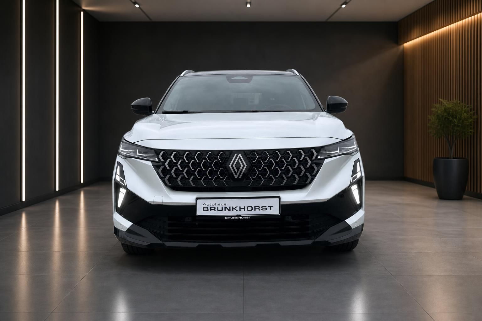 Renault Austral Frontansicht mit charakteristischem Kühlergrill und LED-Scheinwerfern