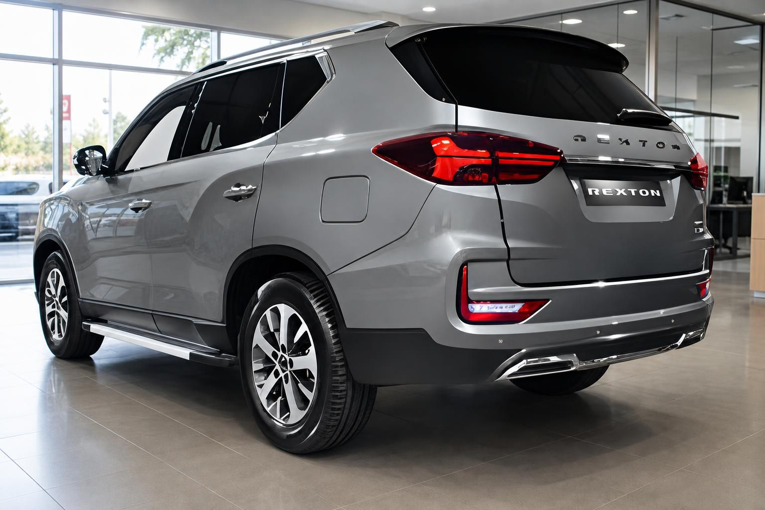 SsangYong Rexton SUV grau Heckansicht schräg mit Rückleuchten im Showroom