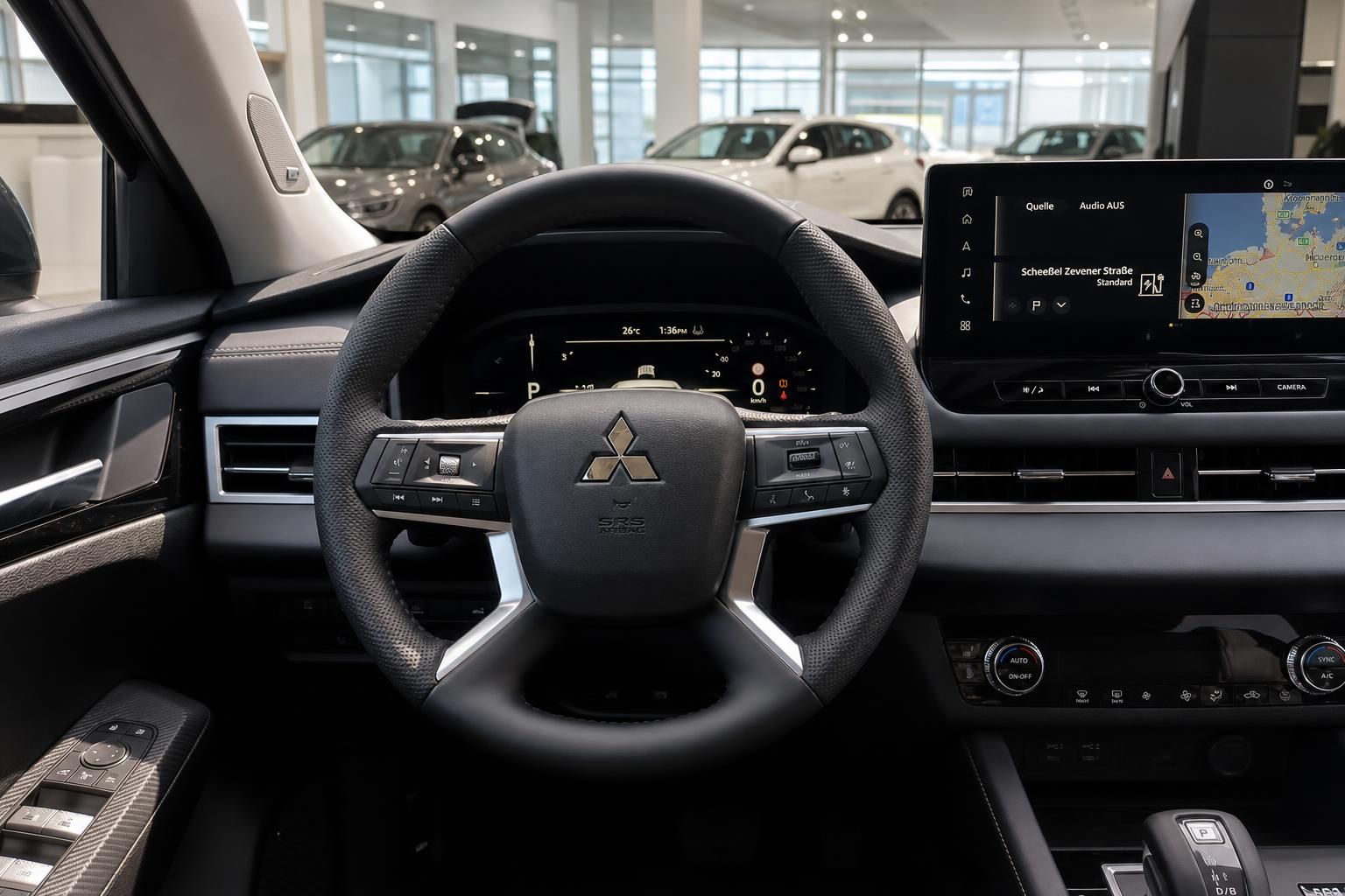Mitsubishi Fahrzeug Cockpit mit Lenkrad, Instrumententafel und Navigationssystem im Innenraum