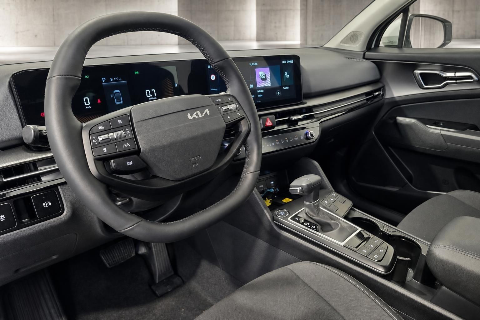 Kia Sportage Innenraum Cockpit mit Lenkrad und Digitaldisplay