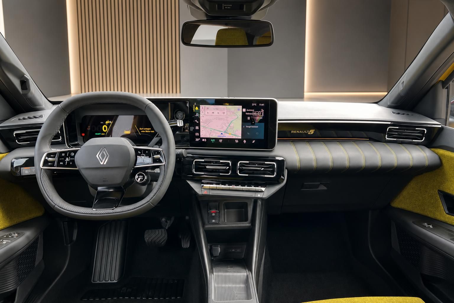 Renault 5 E-Tech Electric Innenraum Armaturenbrett mit Navigationsdisplay und gelben Akzenten