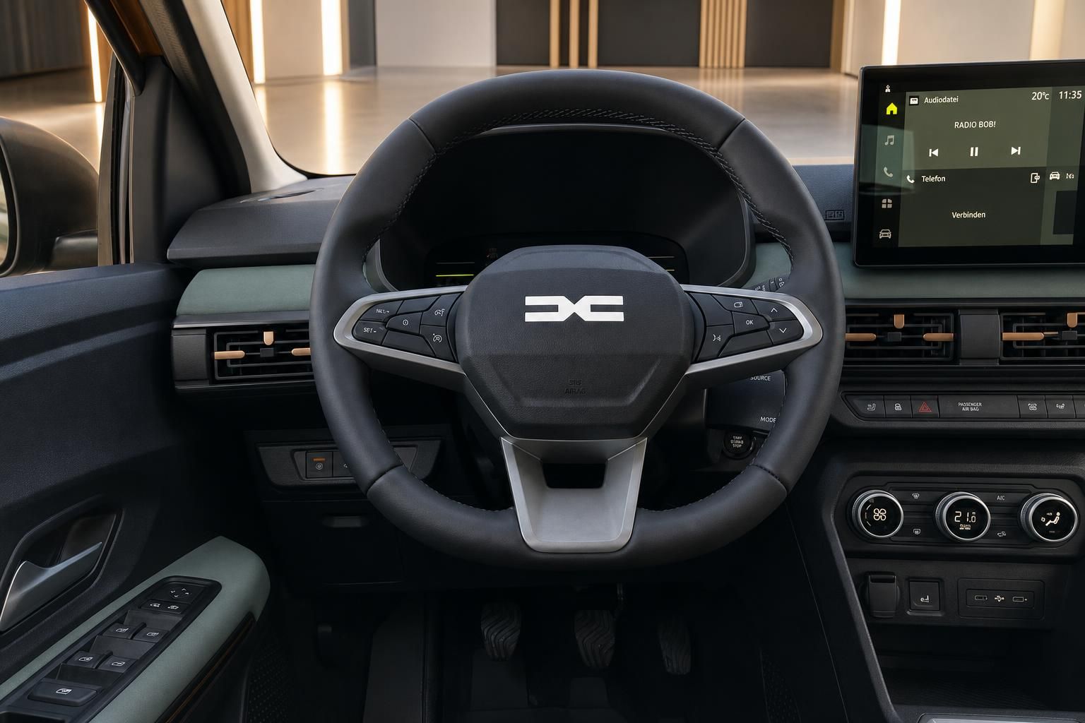 Fahrzeug-Cockpit mit Lenkrad, digitalem Display und Klimaautomatik-Bedienung