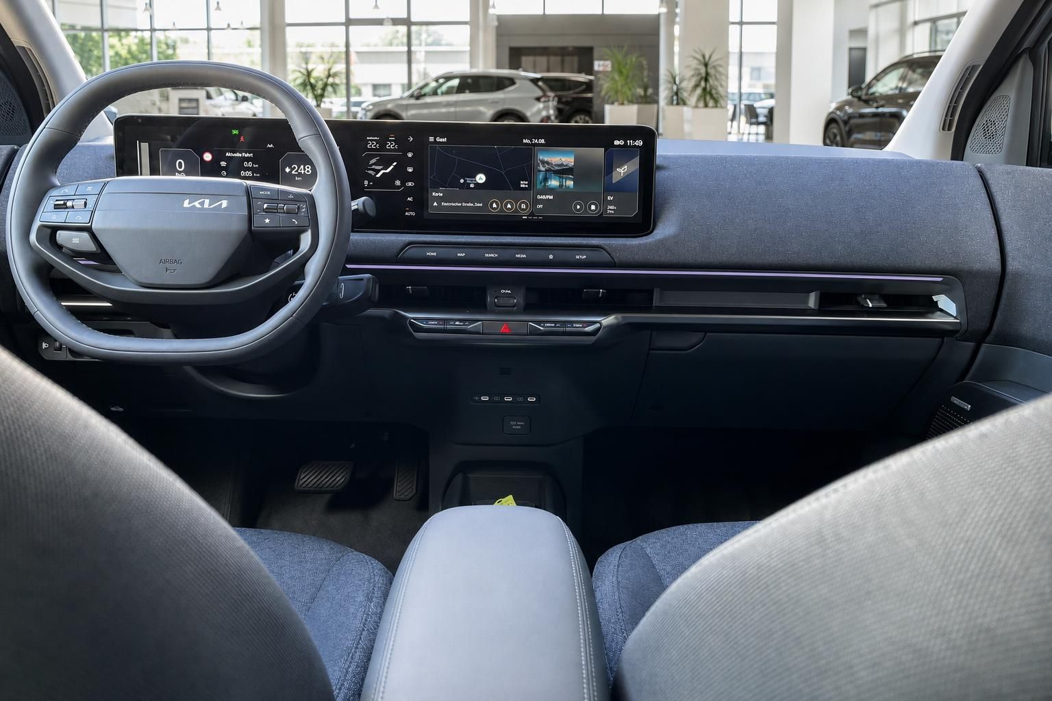 Kia EV2 Cockpit mit Lenkrad und digitalem Infotainment-Display