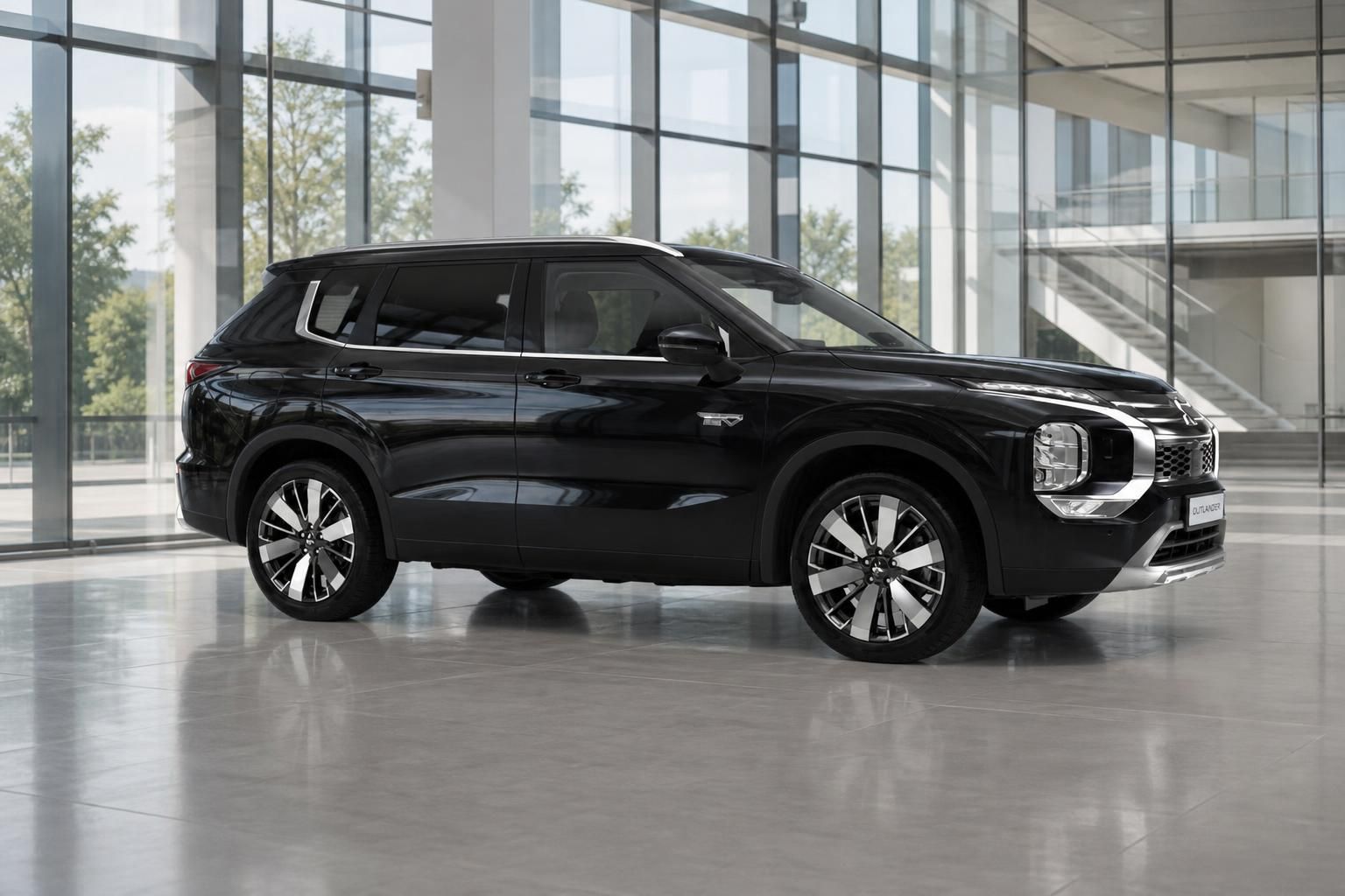 Mitsubishi Outlander schwarz Seitenansicht im modernen Showroom