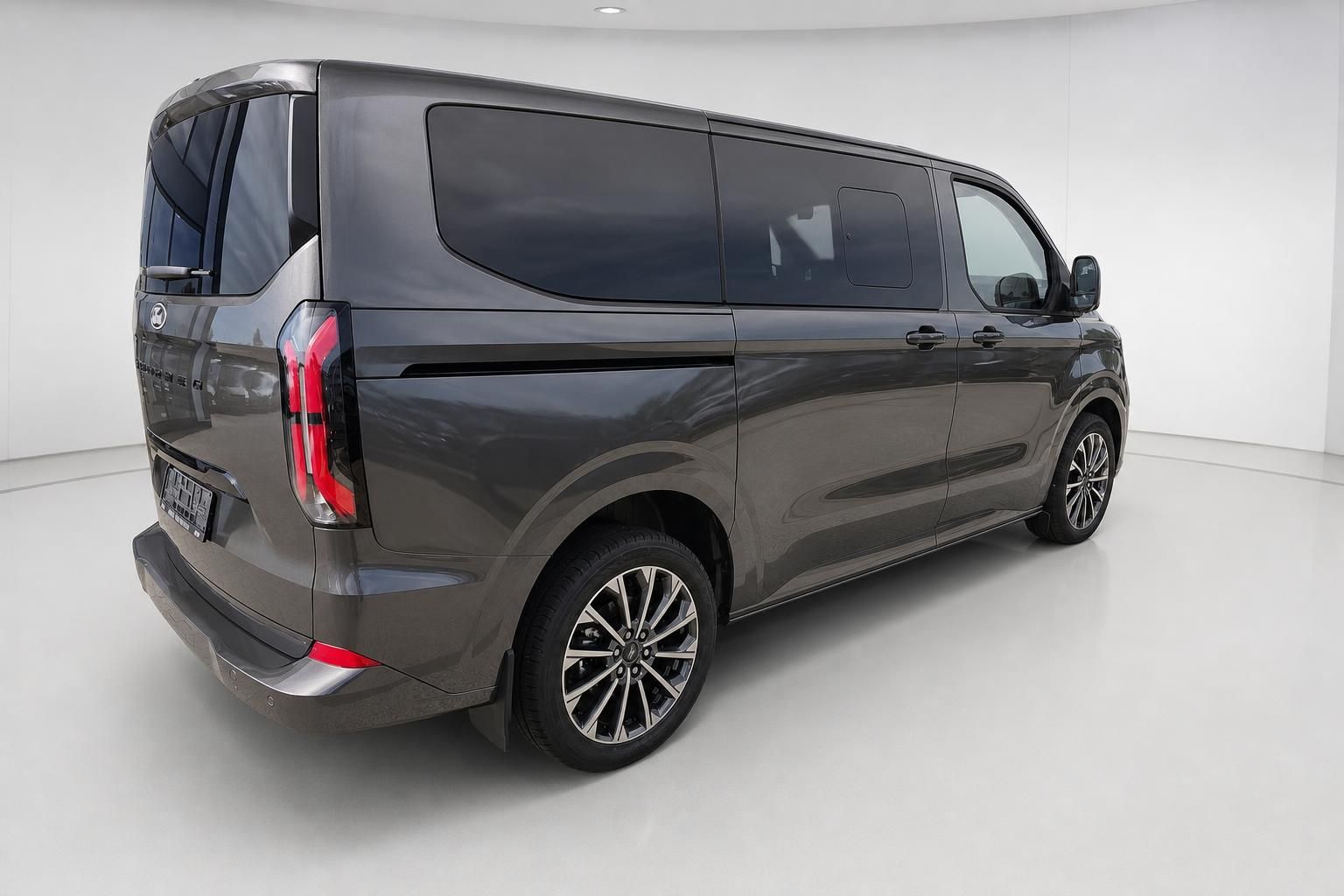 Ford Tourneo Custom grau Heck-Seitenansicht Van