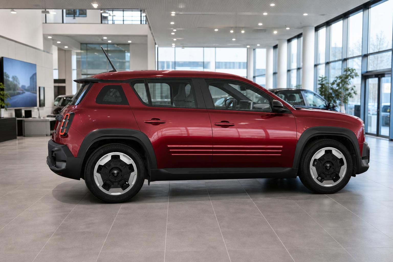 Roter Renault 4 Seitenansicht im Autohaus Showroom