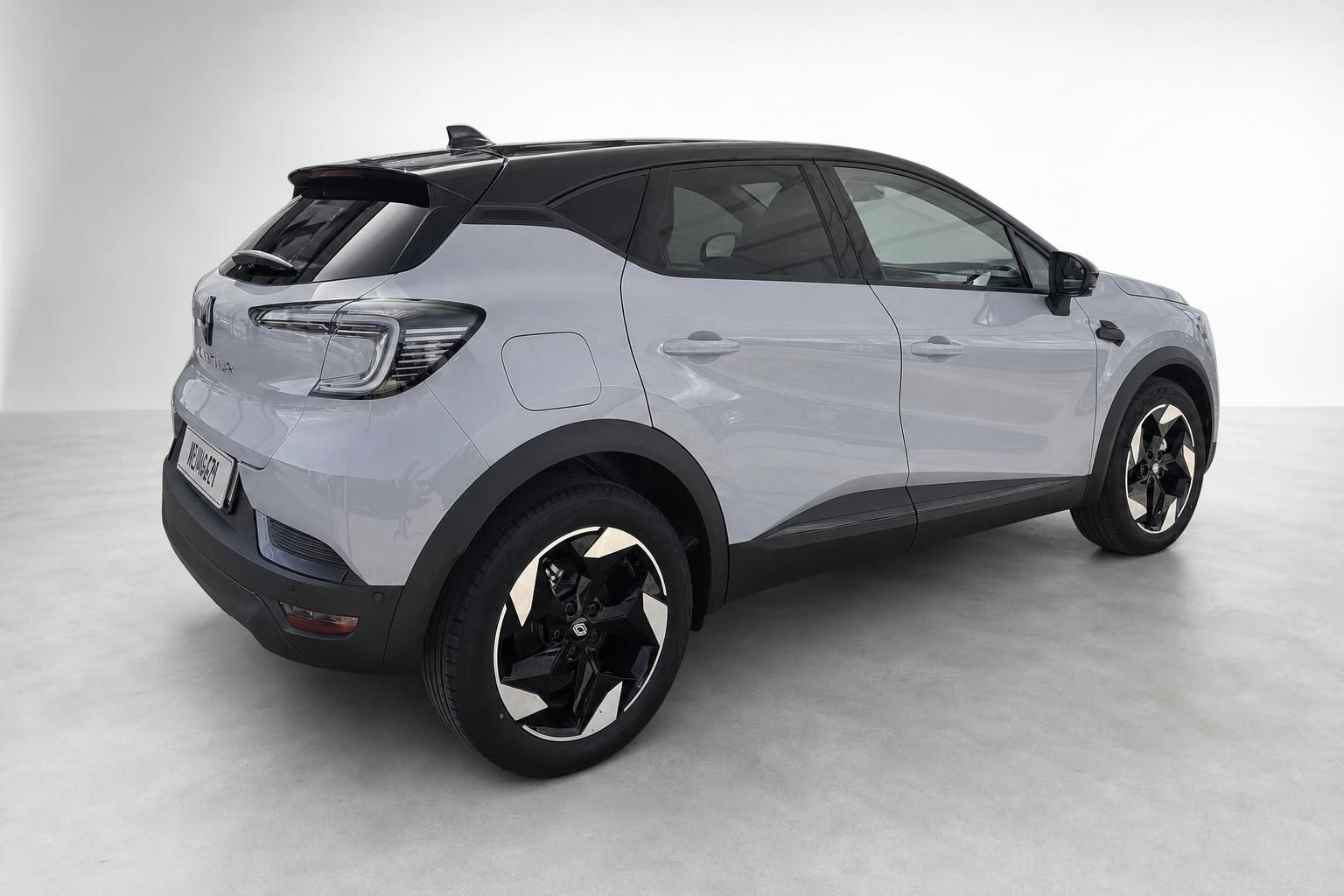 Renault Captur Grau, Seitenansicht von hinten mit Alufelgen