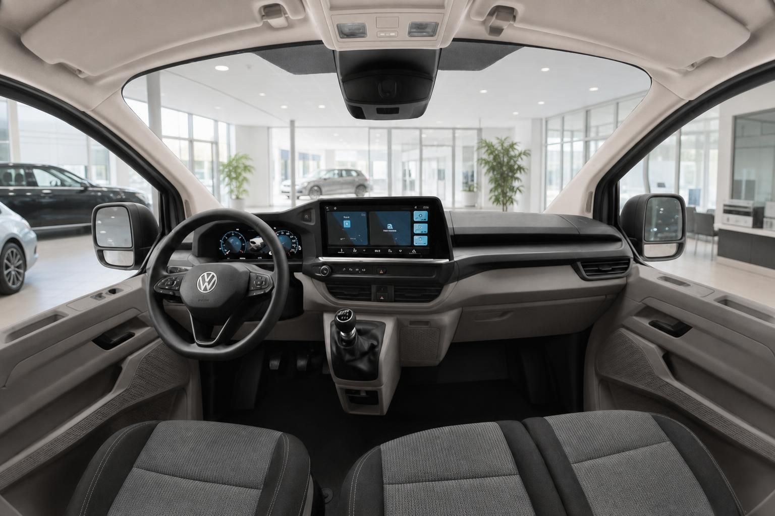 VW Nutzfahrzeug Innenraum mit Cockpit, Lenkrad und Touchscreen