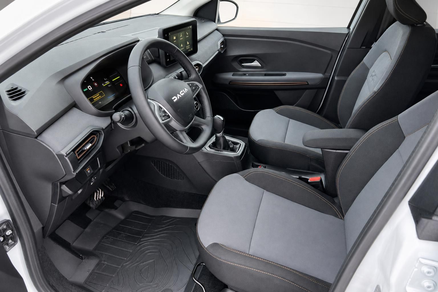Dacia Innenraum grau schwarz Armaturenbrett Lenkrad Fahrersitz