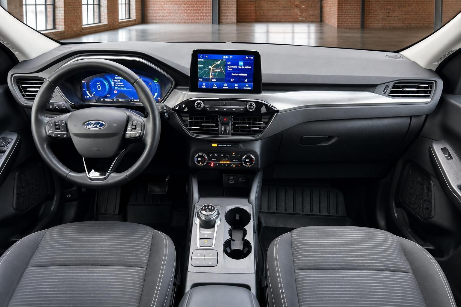 Ford Cockpit Frontalansicht mit Lenkrad und Infotainment System