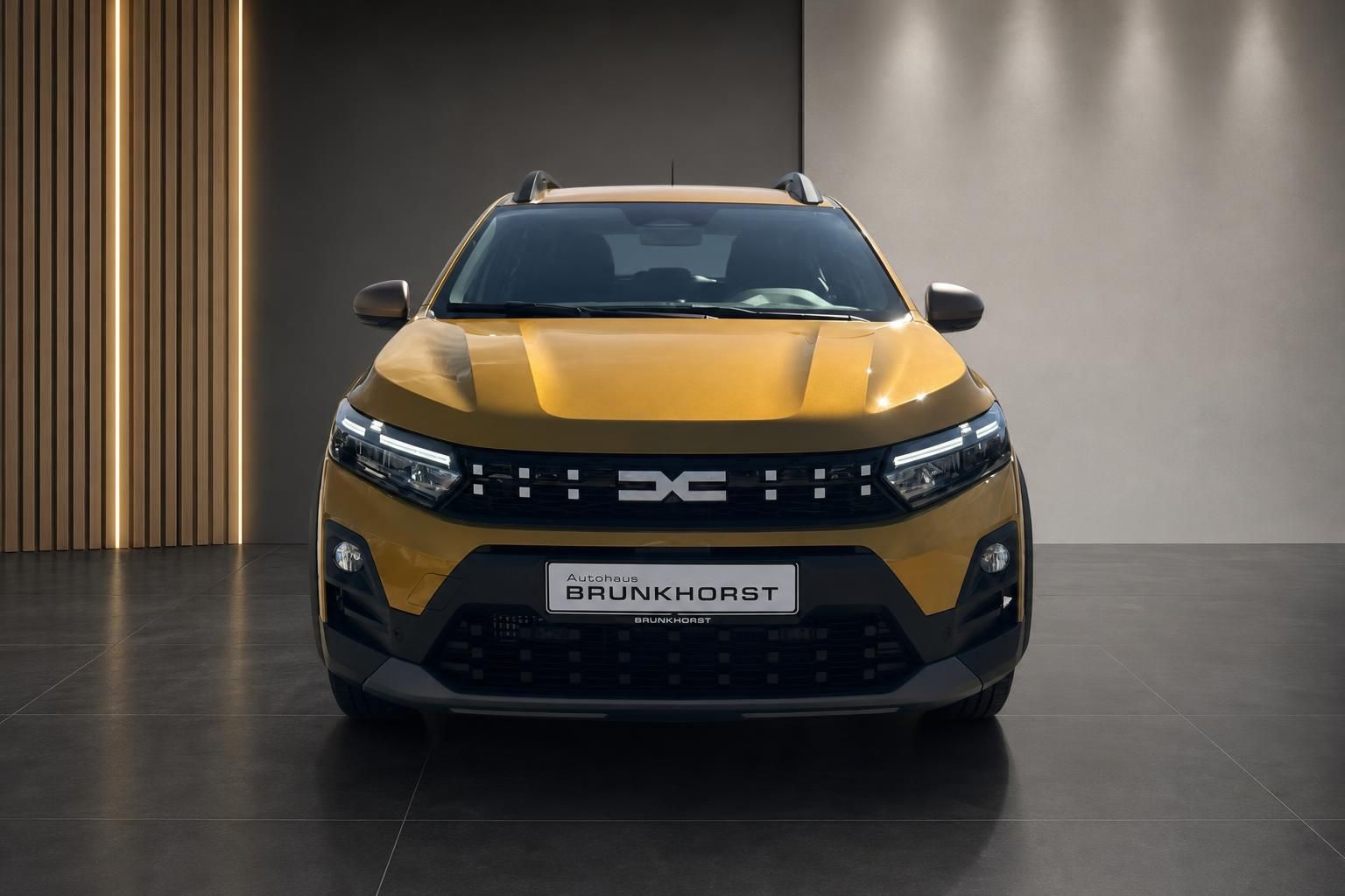 Dacia Sandero Stepway gelb Frontansicht mit LED-Scheinwerfern im Autohaus Brunkhorst