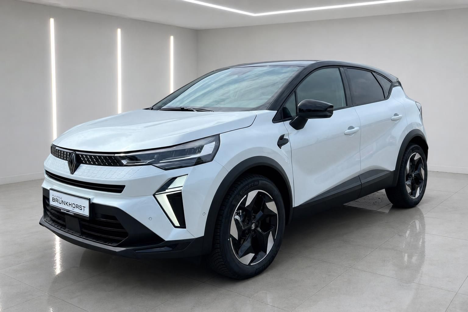 Renault Captur weißer Crossover SUV Seitenansicht mit schwarzen Felgen und Kunststoffverkleidung