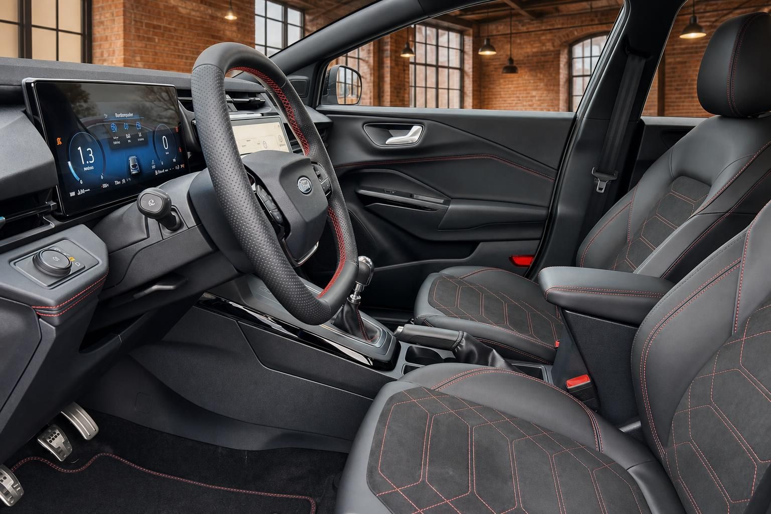 Ford Innenraum mit Sportsitzen, roten Ziernaehten und Digitalcockpit