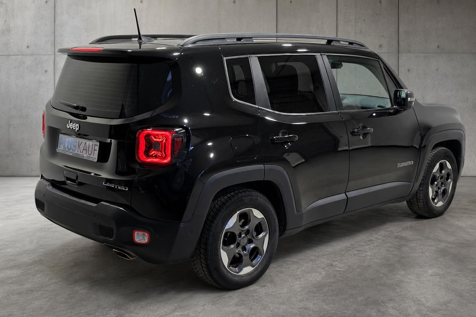 Jeep Renegade Limited schwarz Heck-Seitenansicht mit Dachreling