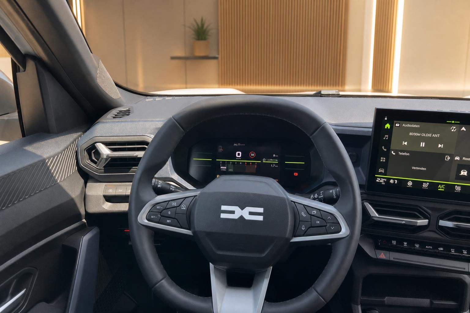 Lenkrad und digitales Kombiinstrument im Fahrzeuginnenraum