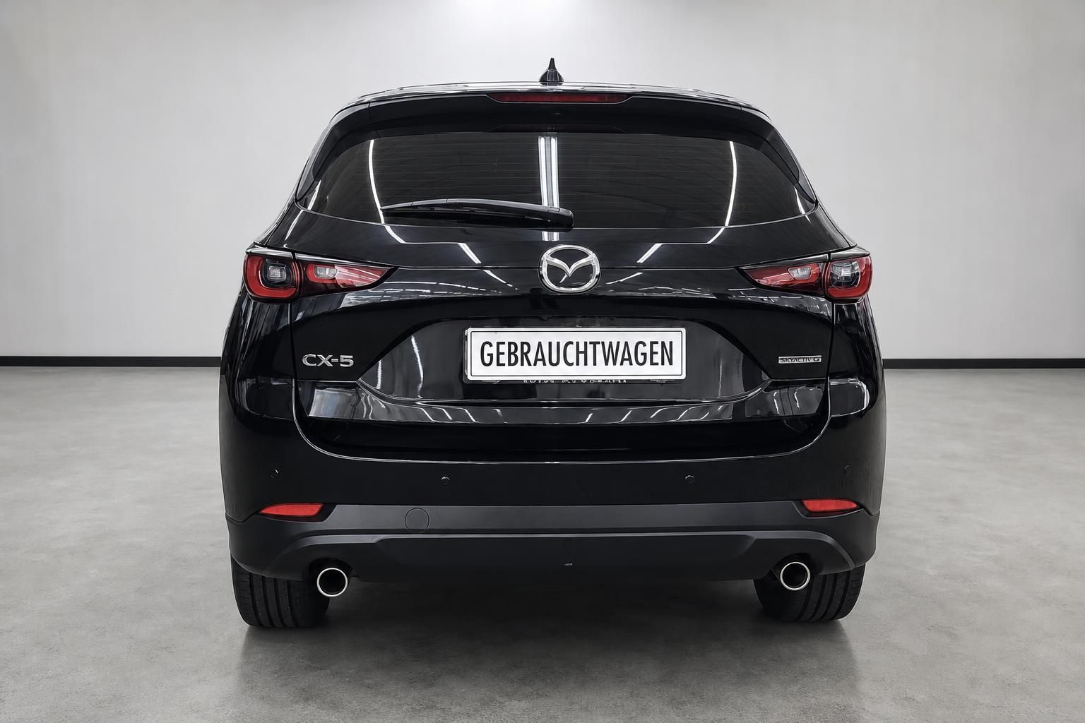 Mazda CX-5 schwarz Heckansicht Gebrauchtwagen Kennzeichen