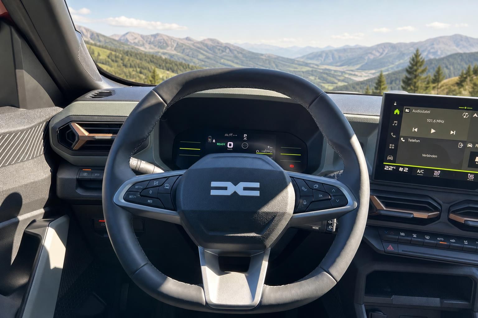 Modernes Cockpit mit digitalen Anzeigen und Lenkrad mit Berglandschaft im Hintergrund