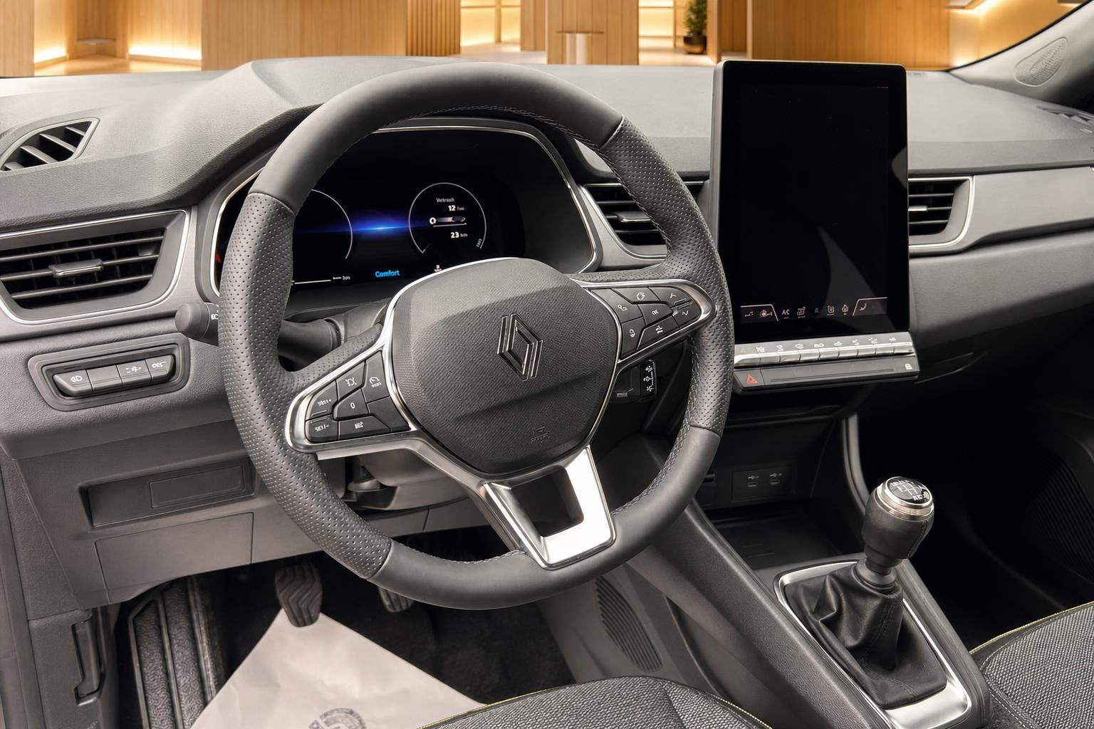 Renault Cockpit mit Lederlenkrad, digitalem Kombiinstrument und großem Infotainment-Touchscreen