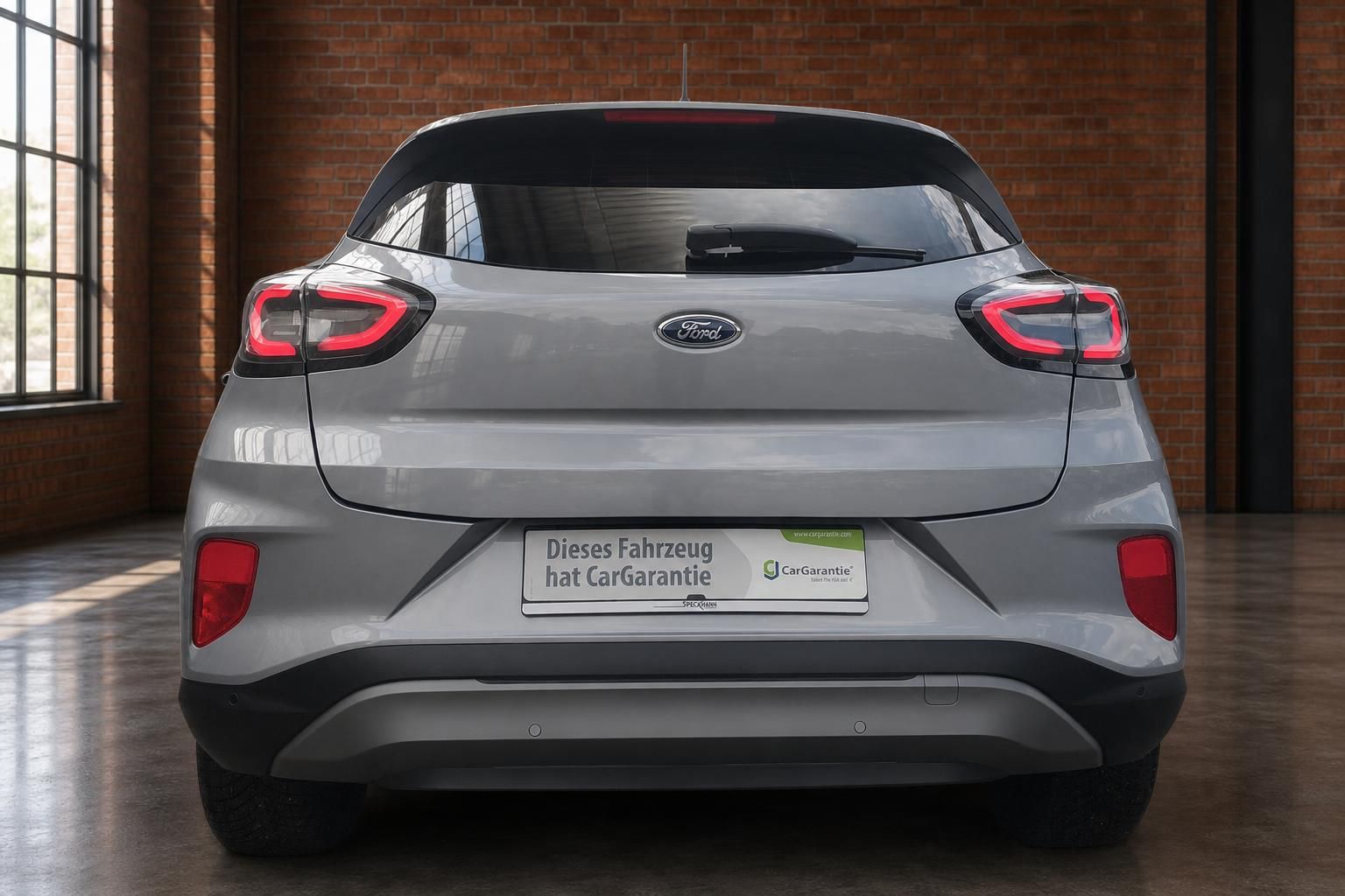 Ford Puma grau Heckansicht gerade – SUV mit LED-Rückleuchten bei Autohaus Speckhahn