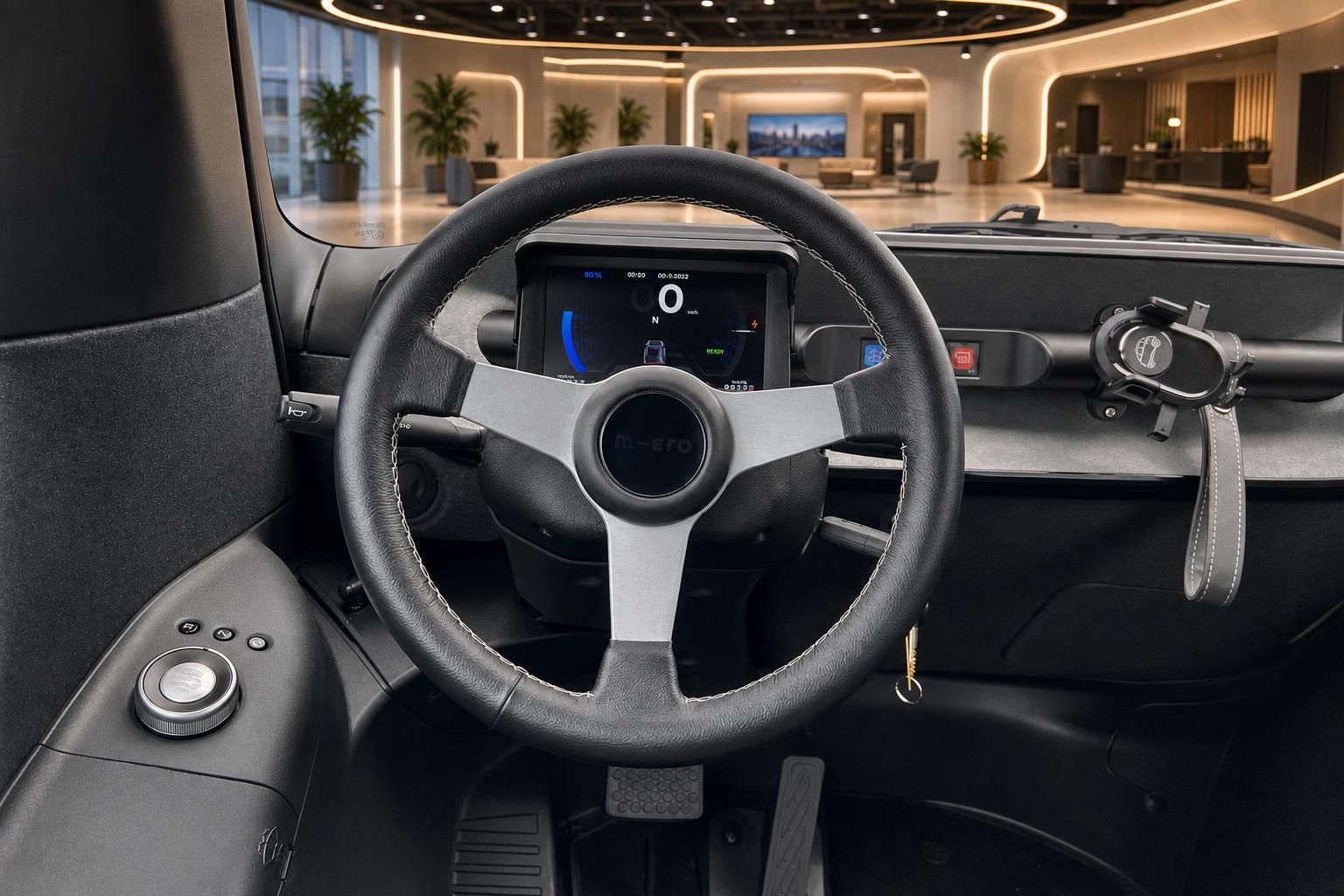 Modernes Fahrzeug-Cockpit mit digitalem Display und Lenkrad in grauer Ausstattung