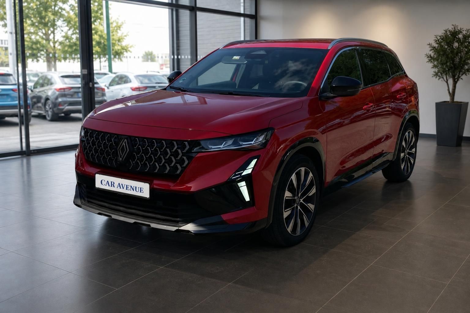 Renault Austral rot Frontansicht im Autohaus-Showroom – SUV Neuwagen kaufen