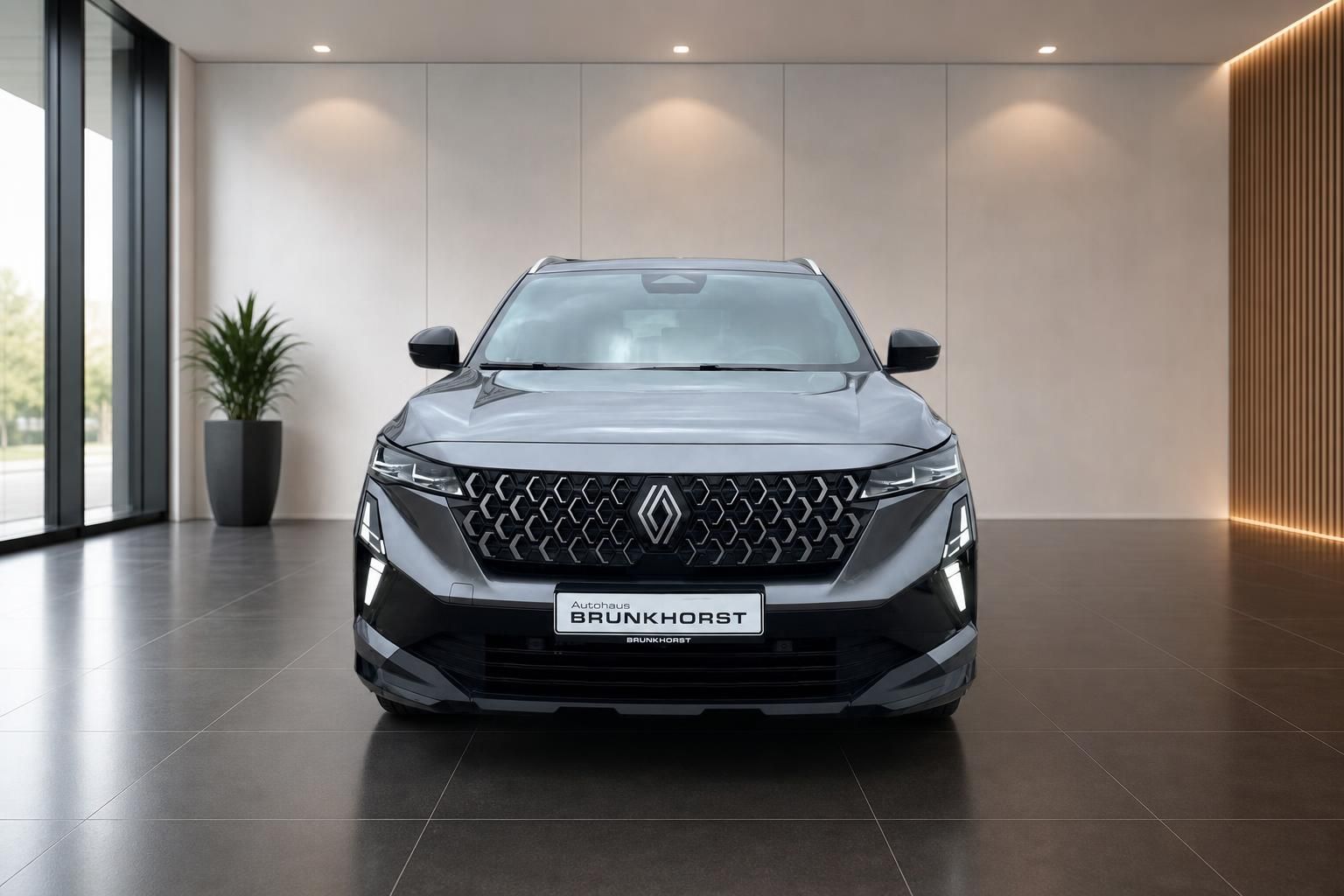 Renault Austral SUV Frontansicht in grau - markanter Kühlergrill und LED-Scheinwerfer