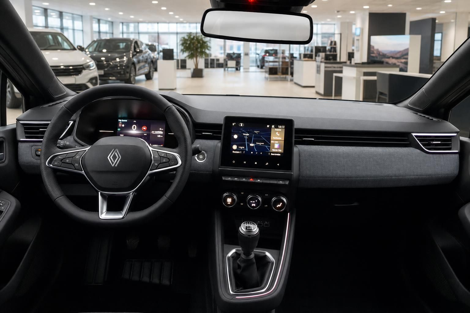 Renault Innenraum mit Cockpit, Lenkrad und Touchscreen im Autohaus