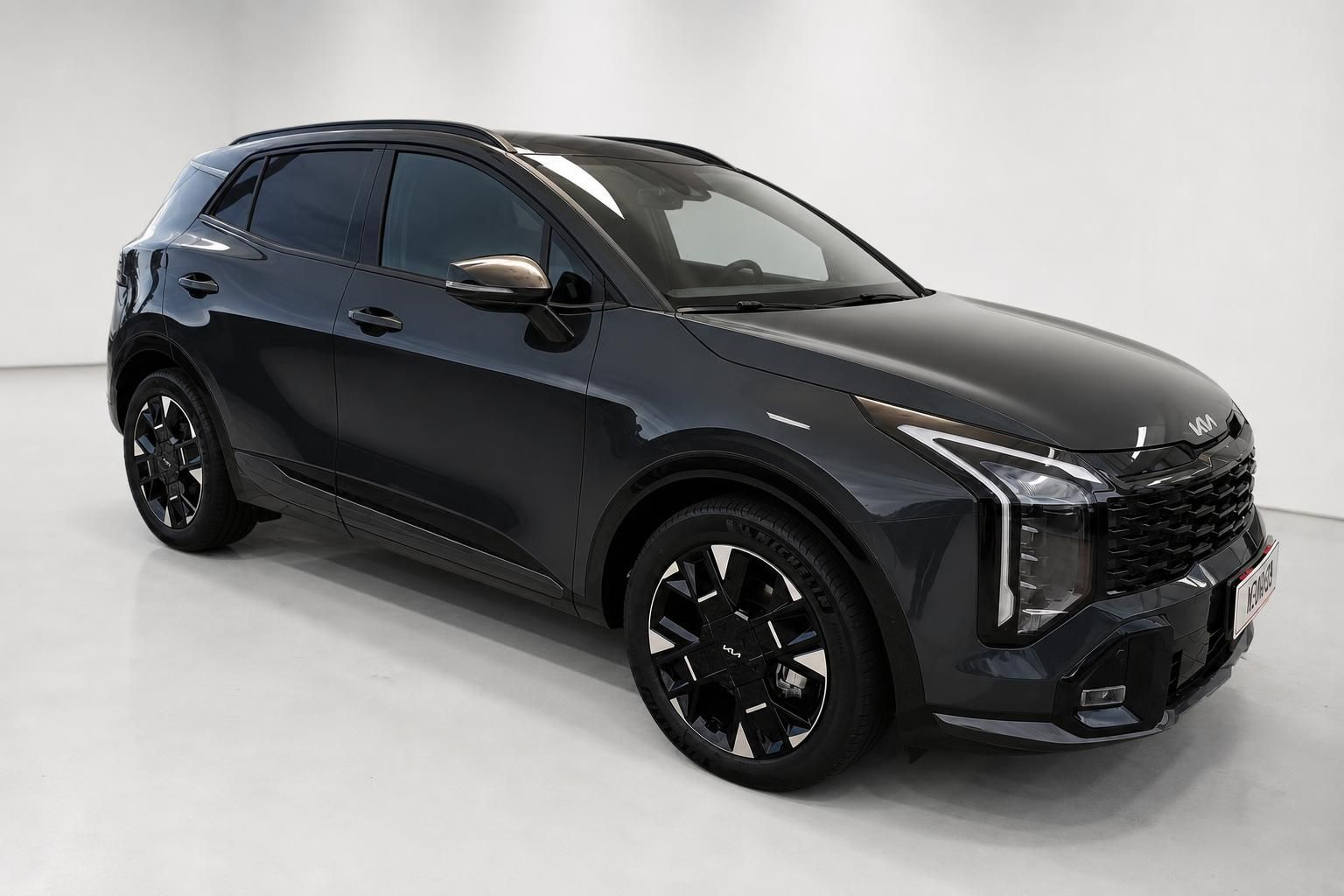 Kia SUV schwarz, Dreiviertelansicht von vorne
