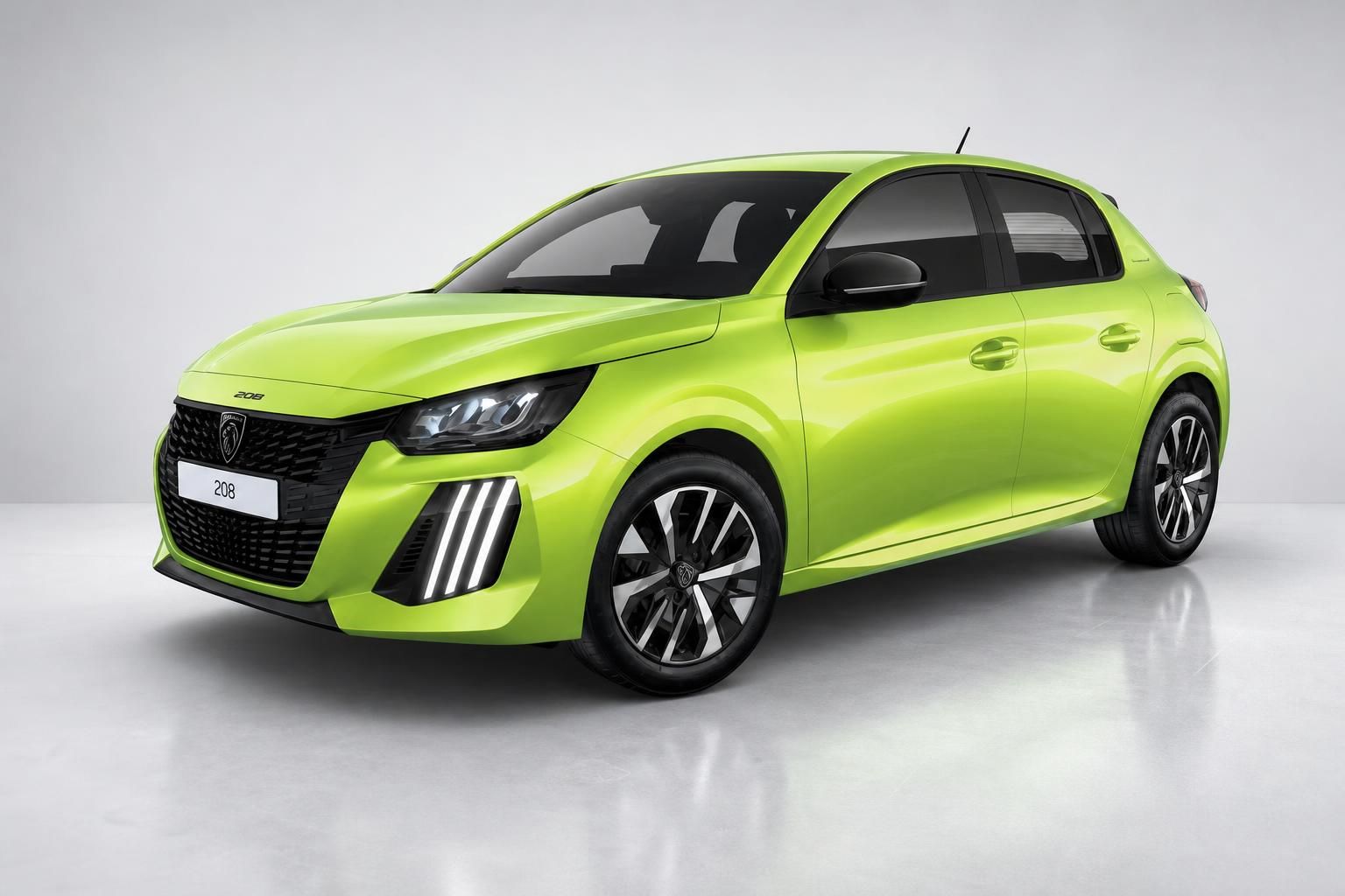 Peugeot 208 Schrägansicht vorne links in Gelbgrün mit Leichtmetallfelgen im Studio