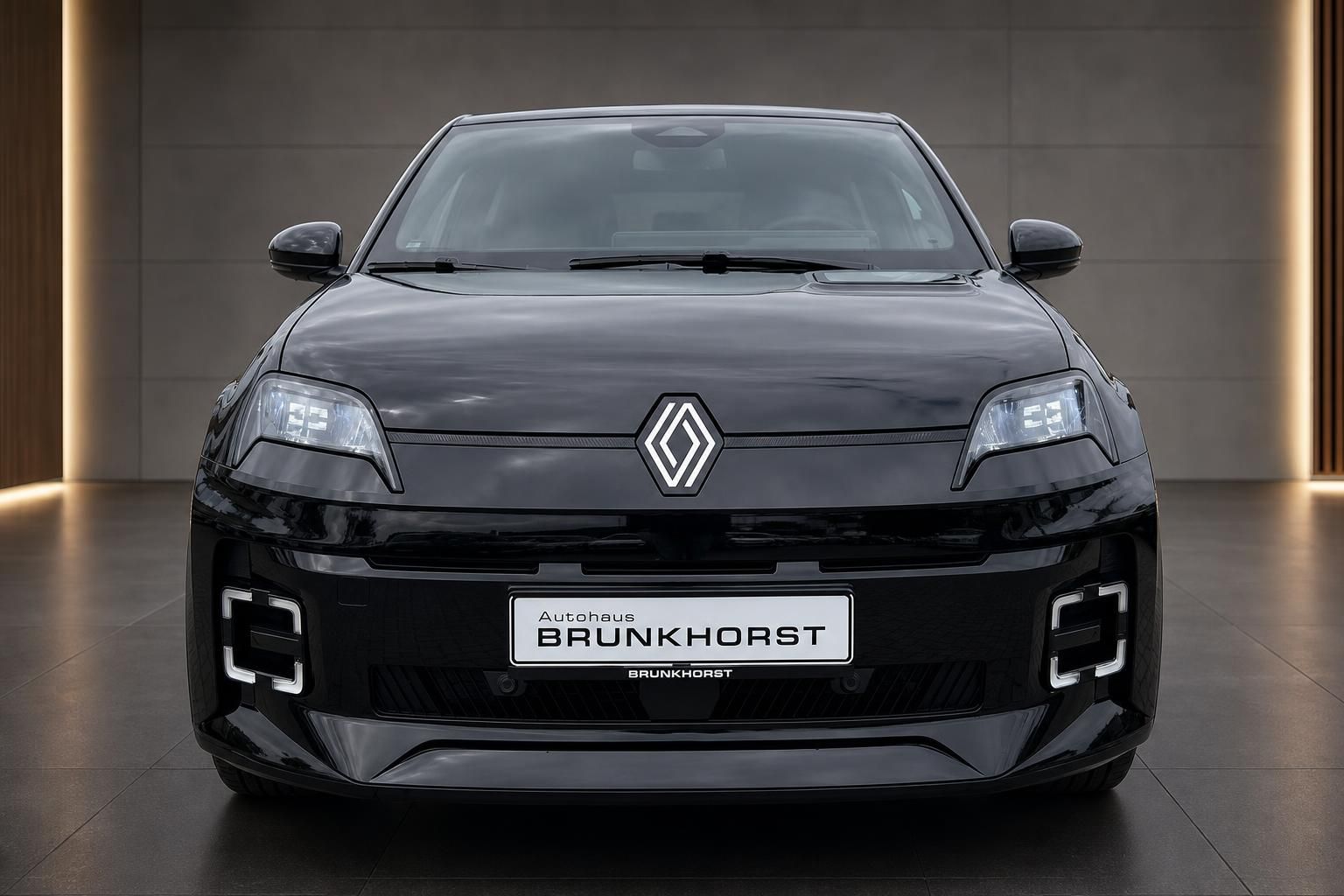 Renault 5 E-Tech schwarz Frontansicht mit LED-Scheinwerfern im Autohaus Brunkhorst