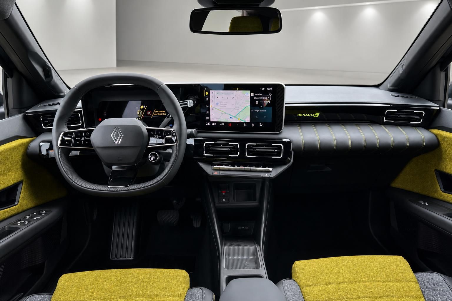 Renault 5 E-Tech Cockpit mit Infotainment-Display gelben Sitzen und Lenkrad Innenansicht