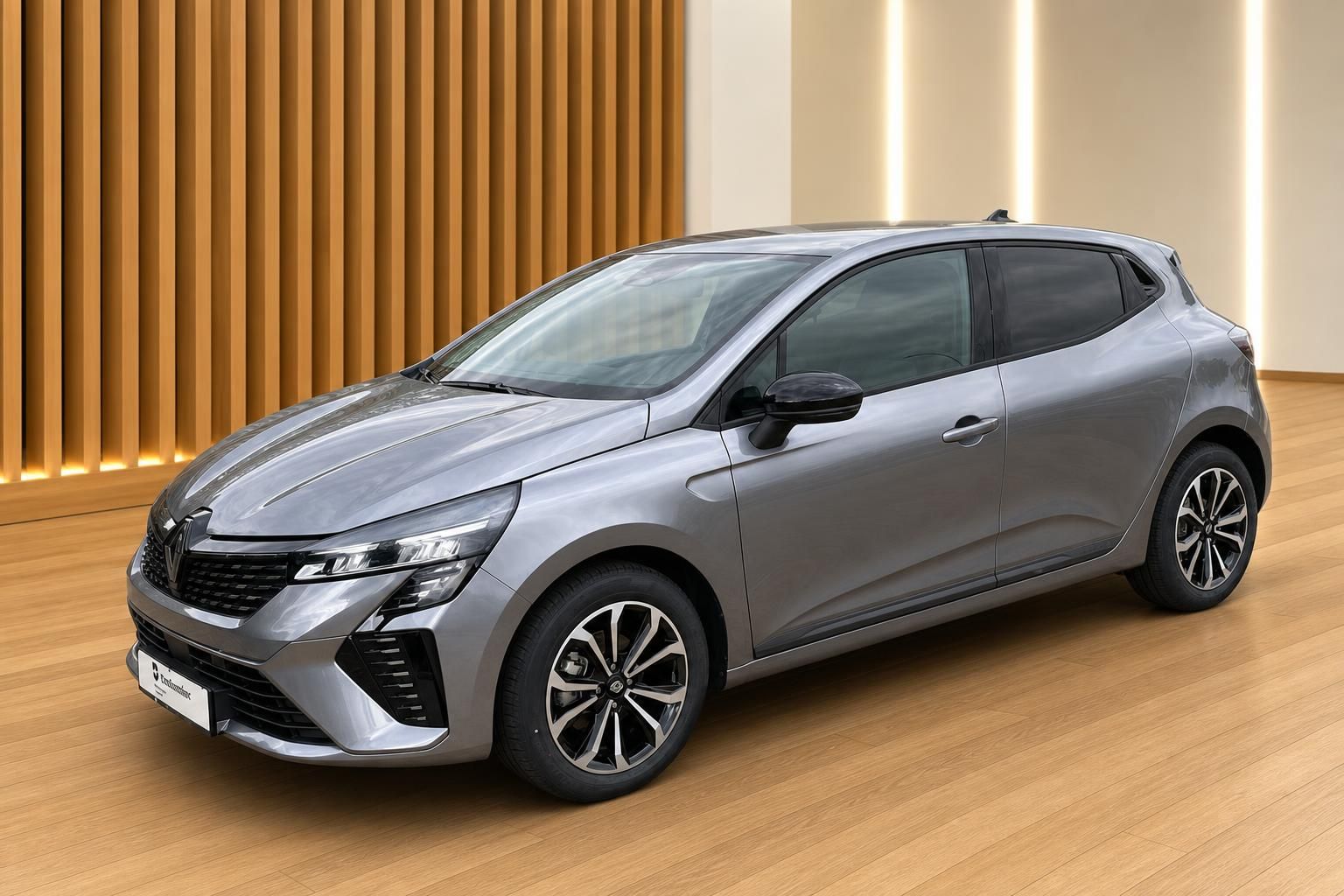 Renault Clio grau Frontansicht schräg rechts – kompakter Kleinwagen mit Leichtmetallfelgen